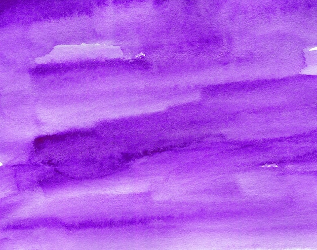 Fondo de acuarela abstracta púrpura sobre papel con textura