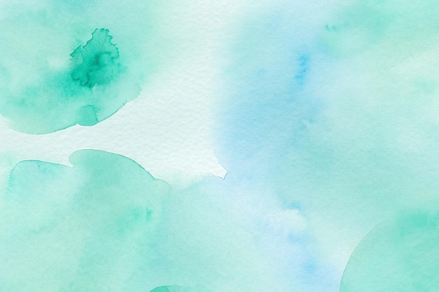 Fondo de acuarela abstracto con tonos azules y verdes