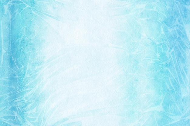 Fondo de acuarela azul invierno helado pintado sobre papel blanco