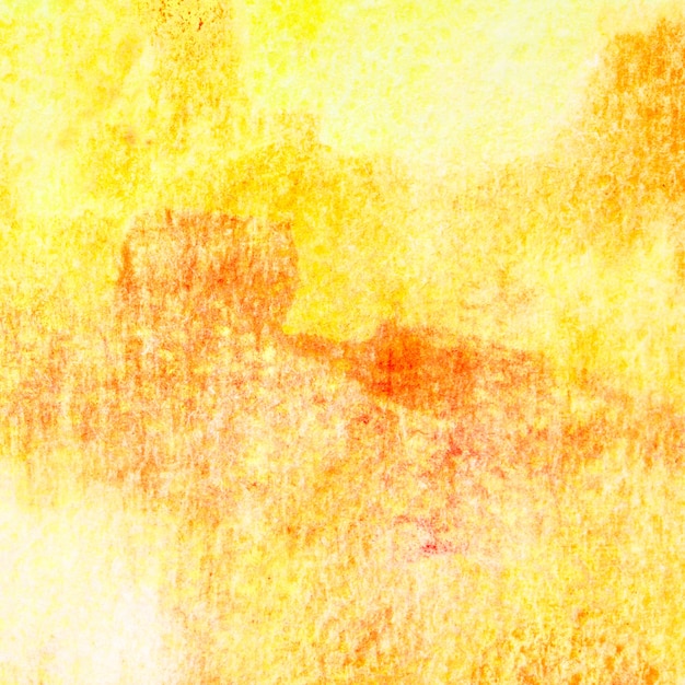 Fondo acuarela dibujado a mano abstracto amarillo-naranja con textura