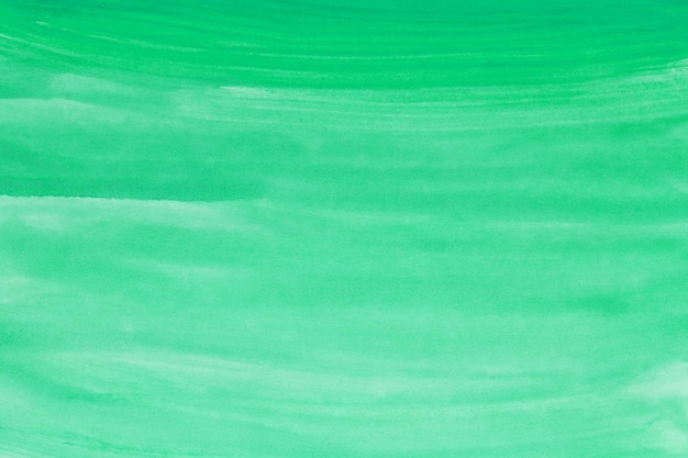 Fondo de acuarela verde pintado a mano con pincel