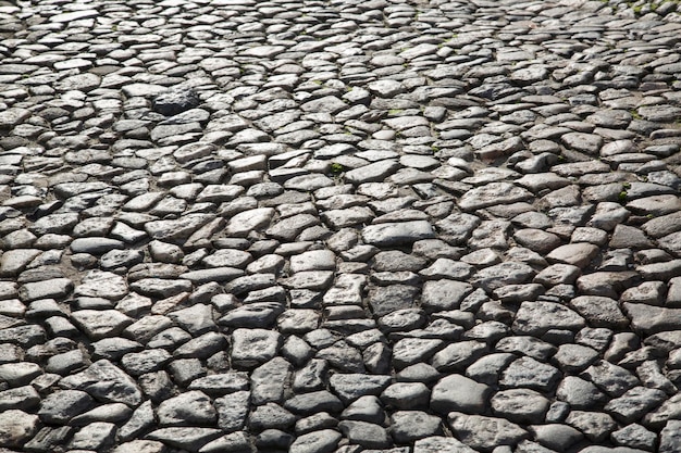 Fondo de adoquines de la calle en Evora, Portugal