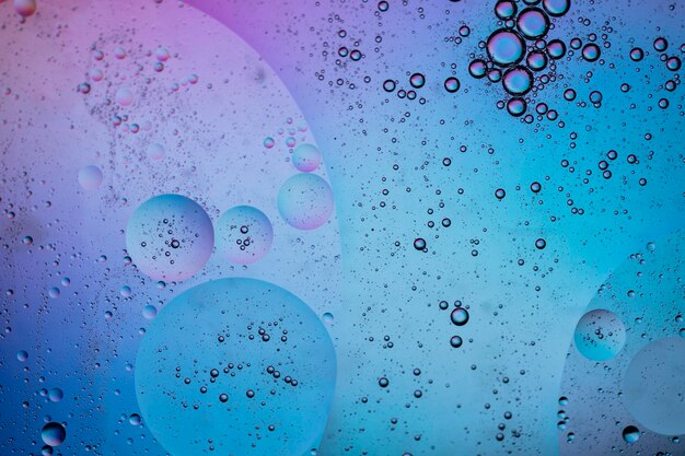 Fondo de agua y aceite macro creativo colorido abstracto con burbujas
