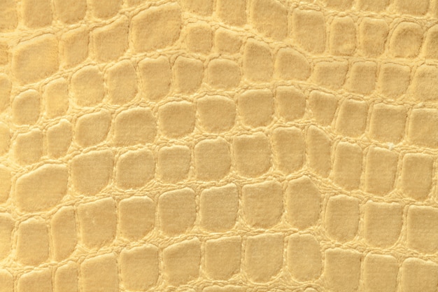 Fondo amarillo oscuro de material textil de tapicería suave