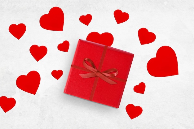 Fondo de amor Día de San Valentín corazones rojos caja de regalo romántica y espacio de copia