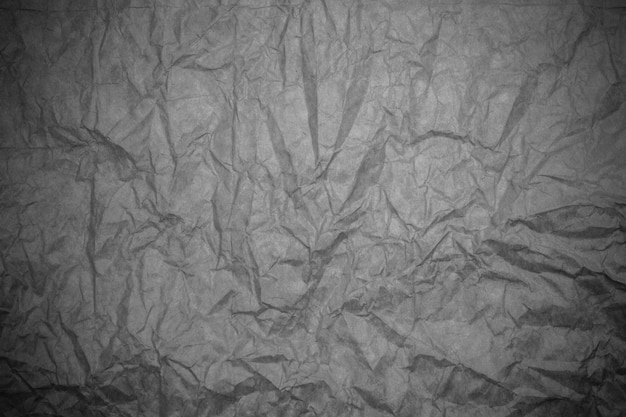 Fondo arrugado gris papel texturizado.