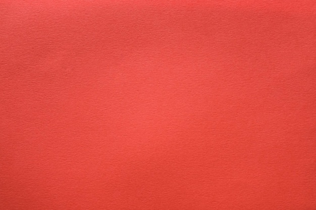 Fondo de arte abstracto de textura de fieltro rojo coral Superficie de material peludo Espacio de copia