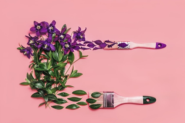 Fondo de arte conceptual de pincel pintando hojas verdes y flores violetas sobre fondo rosa