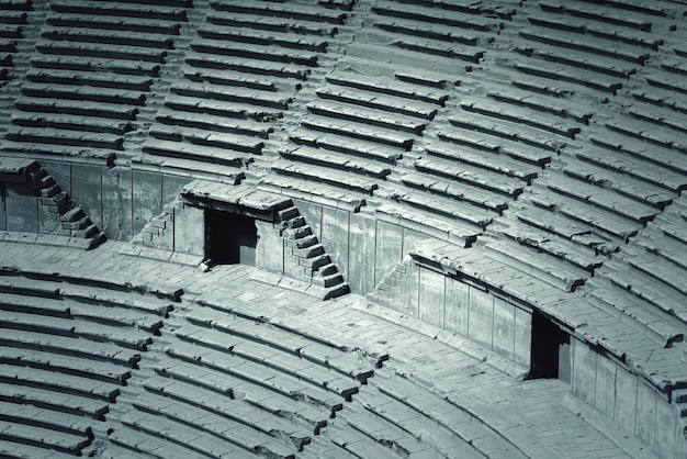 Fondo de asientos de anfiteatro o estadio de piedra