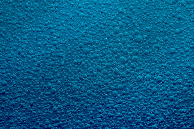 Fondo azul de gotas de aceite