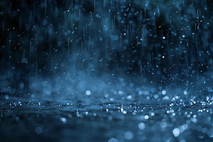un fondo azul con gotas de agua y un fondo azul
