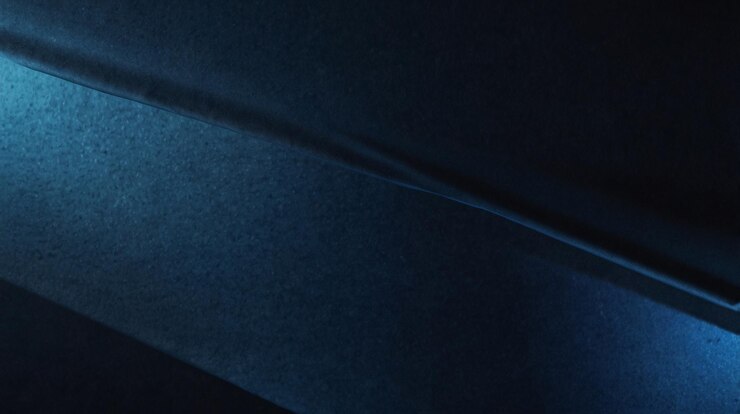 un fondo azul oscuro con un fondo oscuro y un fondo azul escuro