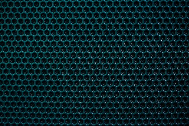 Foto fondo azul patrón hexagonal con sombra negra.