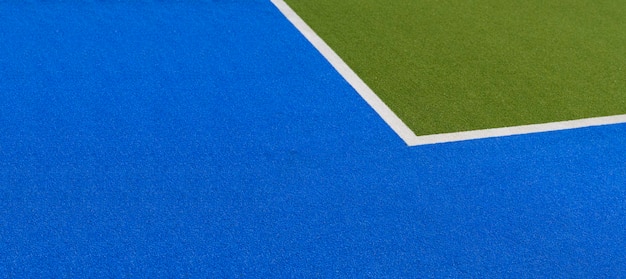 Fondo de la bandera de la cancha deportiva Cancha artificial de colores en el estadio