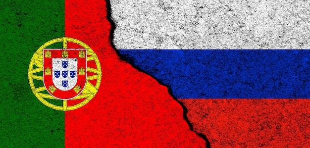 Fondo de banderas de Rusia y Portugal Diplomacia y conflicto político y competencia asociación y cooperación concepto foto