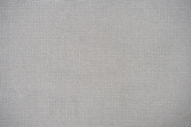 Fondo blanco abstracto para diseño con lienzo gris. Vista desde arriba.