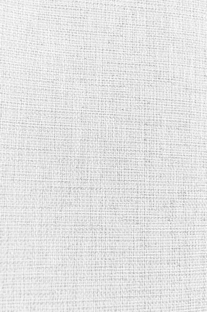 Fondo blanco y detalles de textura de tela.
