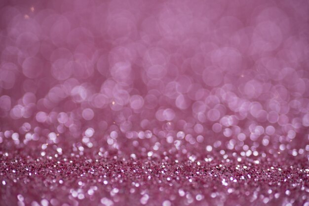 Fondo de bokeh de brillo rosa desenfocado