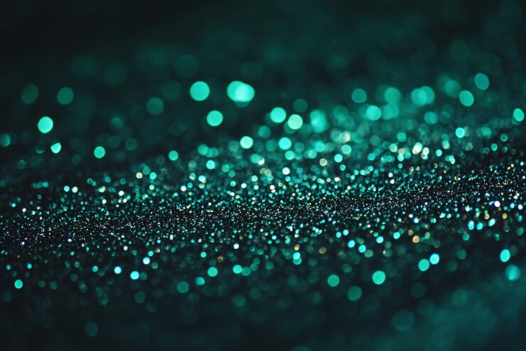 El fondo de Bokeh de brillo verde brillante