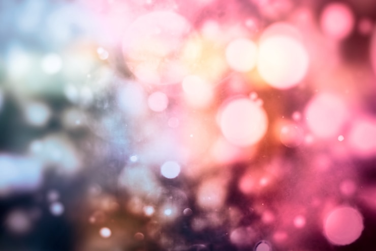 Foto el fondo de bokeh circular abstracto y brillante es borroso sobre un fondo oscuro