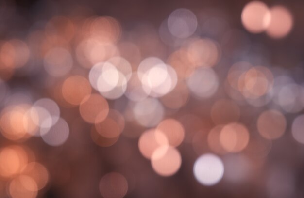 Fondo de bokeh de iluminación de ciudad naranja pálido