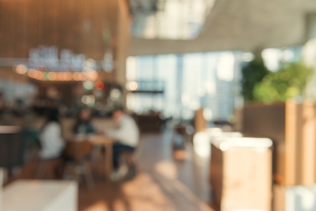 Fondo borroso - cafetería en la construcción de desenfoque de fondo con bokeh. Imagen filtrada vintage. Bandera panorámica.