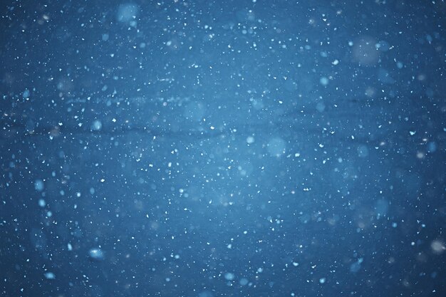 Fondo borroso naturaleza nevada, diseño abstracto de copos de nieve cayendo