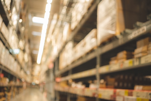 Foto fondo borroso de stock de productos de inventario interior de almacén para antecedentes logísticos, negocios globales para una buena importación y exportación, entrega industrial de almacenamiento de existencias, tienda de contenedores de carga de fábrica