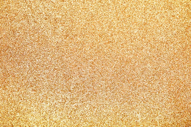 Fondo de brillo dorado textura enfocado