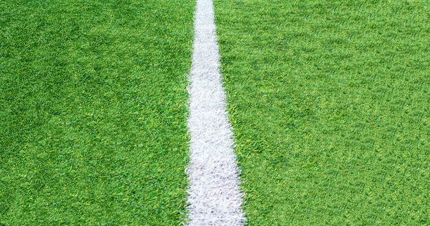 Fondo de campo de fútbol de hierba verde, vista superior de primer plano