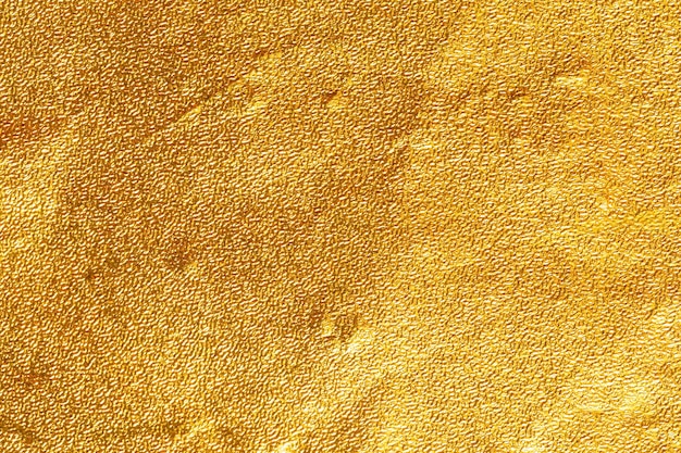 Fondo de cartón de textura de hoja de papel dorado