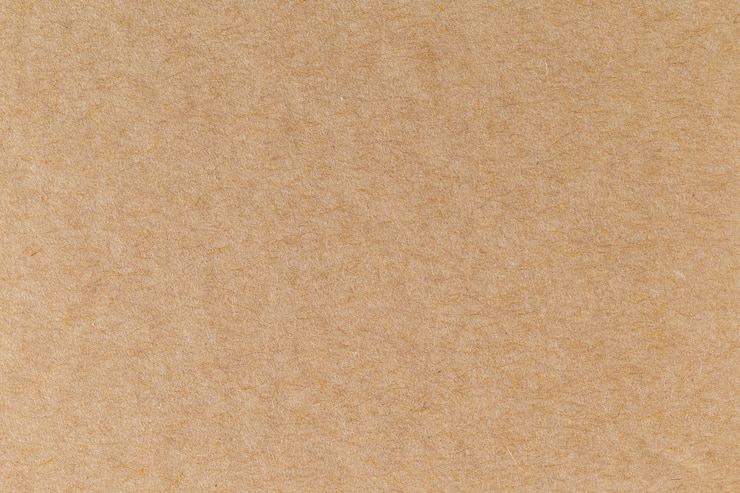 Foto fondo de cartón de textura de hoja de papel kraft reciclado eco marrón.