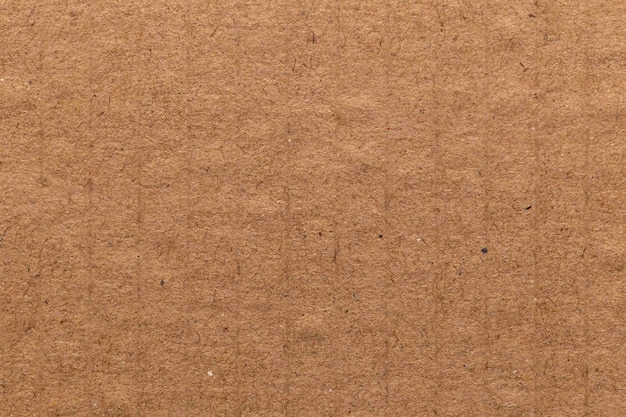 Fondo de cartón de textura de hoja de papel kraft reciclado ecológico de color marrón