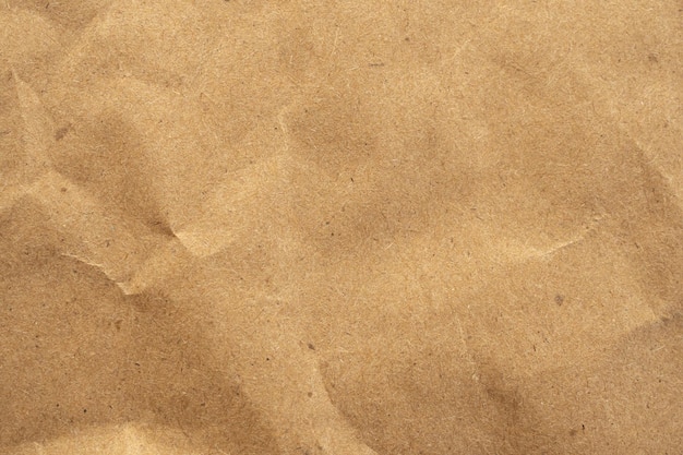 Fondo de cartón de textura de papel kraft reciclado ecológico marrón viejo