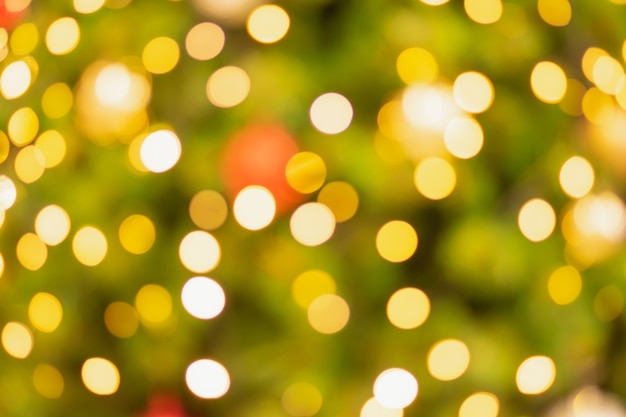 Fondo de círculo bokeh dorado y multicolor para navidad y feliz año nuevo con espacio para mostrar mensajes