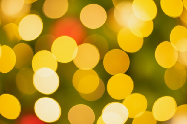 Fondo de círculo bokeh dorado y multicolor para navidad y feliz año nuevo con espacio para mostrar mensajes