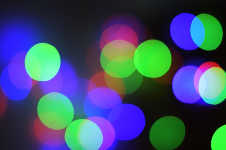 Fondo de círculos Bokeh Luces desenfocadas en colores RGB