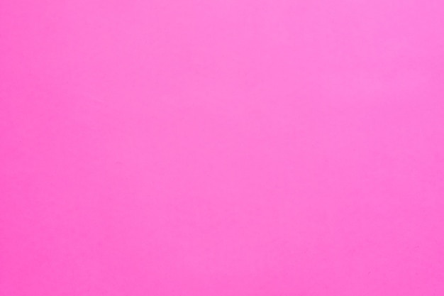 Foto fondo de color sólido rosa vibrante. superficie magenta lisa. pintura moderna. creatividad y arte