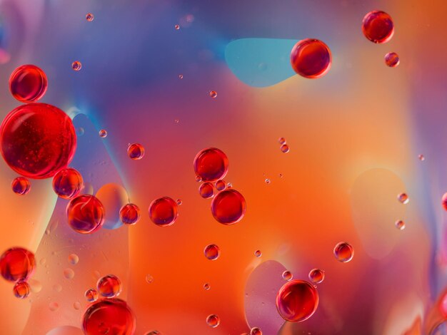 Fondo colorido con gotas de aceite y agua