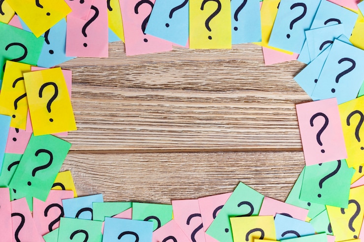 Foto fondo colorido del marco de los signos de interrogación escrito boletos