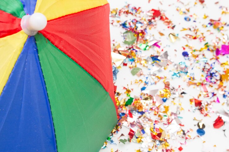 Foto fondo colorido con paraguas de carnaval