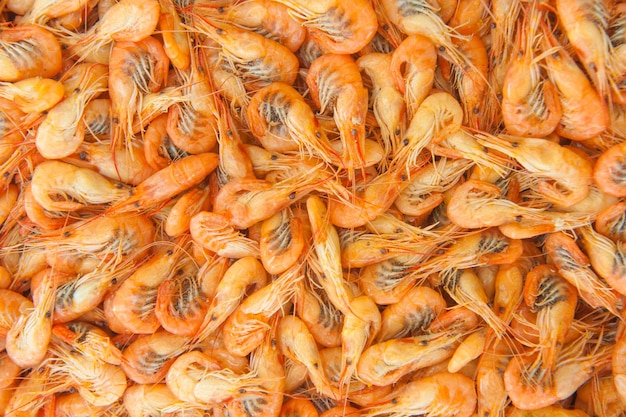 Fondo de comida de camarones cocidos vista superior telón de fondo de mariscos saludables