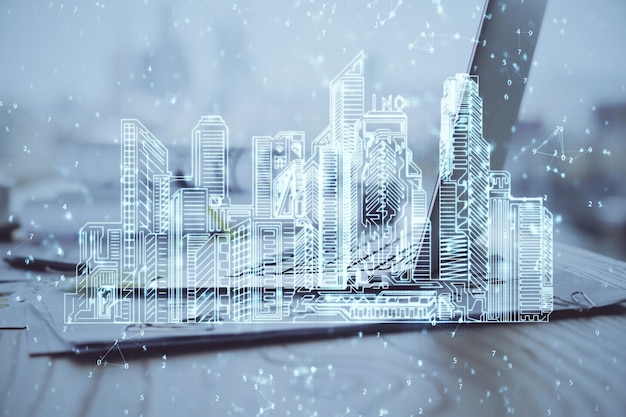 Fondo de computadora de escritorio en oficinas y edificios de la gran ciudad dibujo de holograma Doble exposición Concepto de ciudad inteligente
