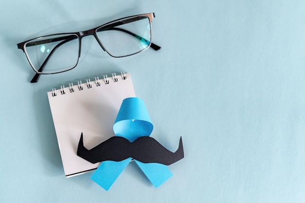 Fondo de concienciación sobre el bigote de Movember con gafas.