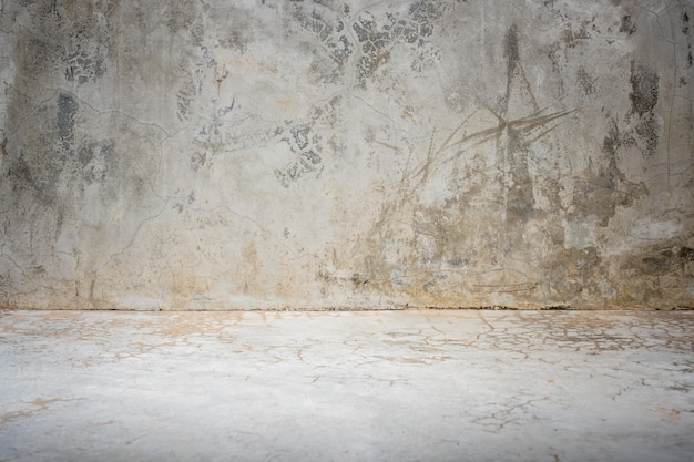 Fondo concreto de la sala de estudio de grunge con luz