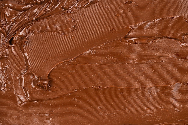 Foto fondo de crema de chocolate. espacio para texto o diseño.