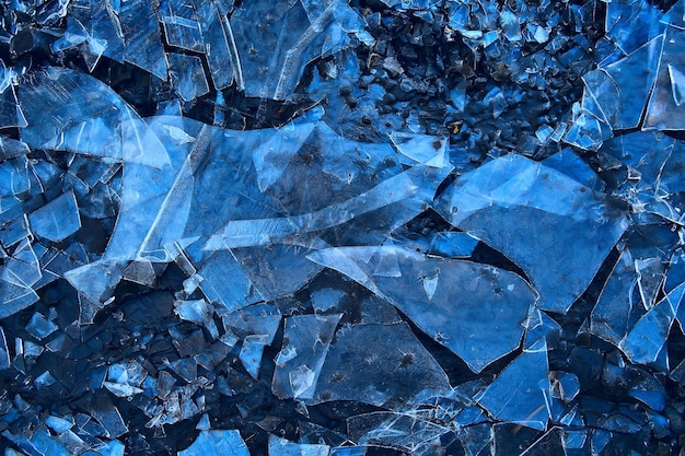 fondo de cristal de hielo azul, textura abstracta de la superficie del hielo en el cristal, agua de temporada congelada