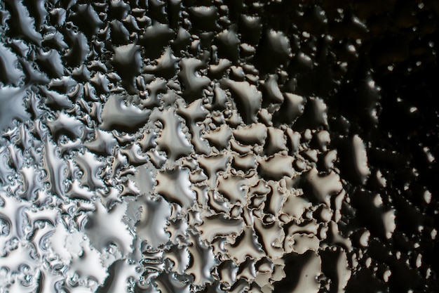 Fondo cubierto con gotas de agua en primer plano