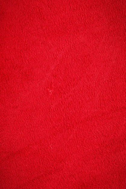 Fondo de cuero genuino de gamuza roja Foto de primer plano de fondo rojo terciopelo