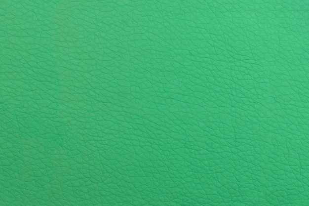 Fondo de cuero verde. Superficie de textura con un patrón.